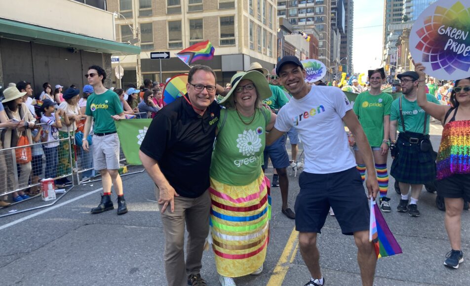 Mike Schreiner, Elizabeth May and Jonathan Pednault walking in the Pride Parade.